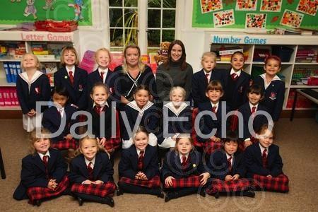 Children in Reception Class at Talbot Heath School with Teacher Mandy Pidgley, right, and TA Nicola French.