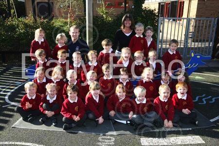 Reception children at Lytchett Matravers Primary School with Teacher Tony Maguire, left, and TA Anita Coombs.