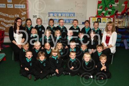 Reception children at Hillbourne School and Nursery in Poole with Teacher Zoe Nash, left, and TA Teresa Cross.