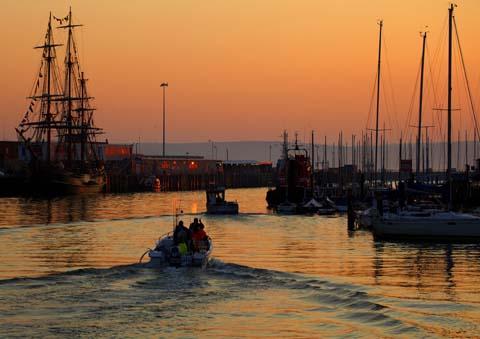 Weymouth Harbour at sunrise, by Chris Eaves 