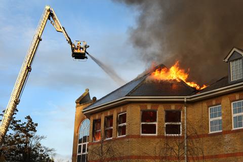Between 50-60 firefighters are dealing with a fire at Lytchett Minster School's theatre block. Pictures by Richard Crease and Michelle Luther.