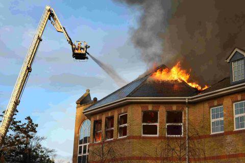 Dorset Fire and Rescue at the scene of a fire that engulfed the arts block and Gainsford Theatre at Lytchett Minster School on December 2