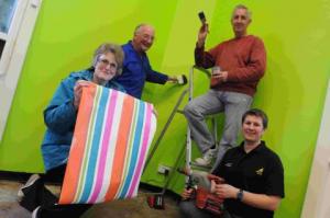 TAKING OVER: Decorating Charmouth Library. Above, volunteers Geoffrey Brierley, Mandy Harvey, Jane Clifford, David Clifford and Hazel Robinson outside the library