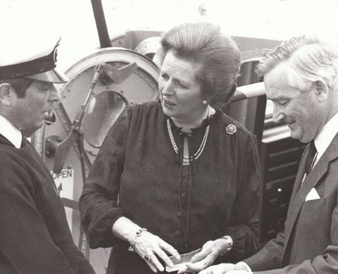 In July 1982 Prime Minister Margaret Thatcher opened the new RNLI Bill Knott building in Poole. She is seen here with Staff Coxswain Edward Mallinson, left, and Cmdr Cairns.