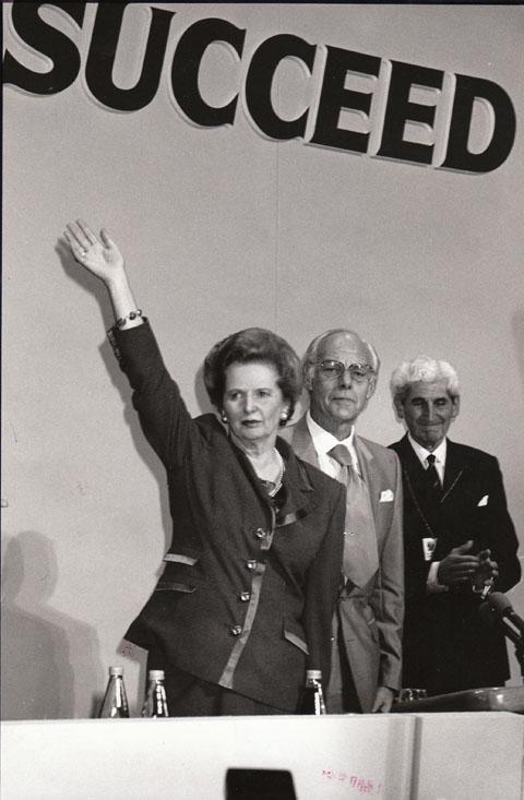 In October 1990 Prime Minister Margaret Thatcher acknowledges the standing ovation from delegates after her closing speech at the Conservative conference in Bournemouth.