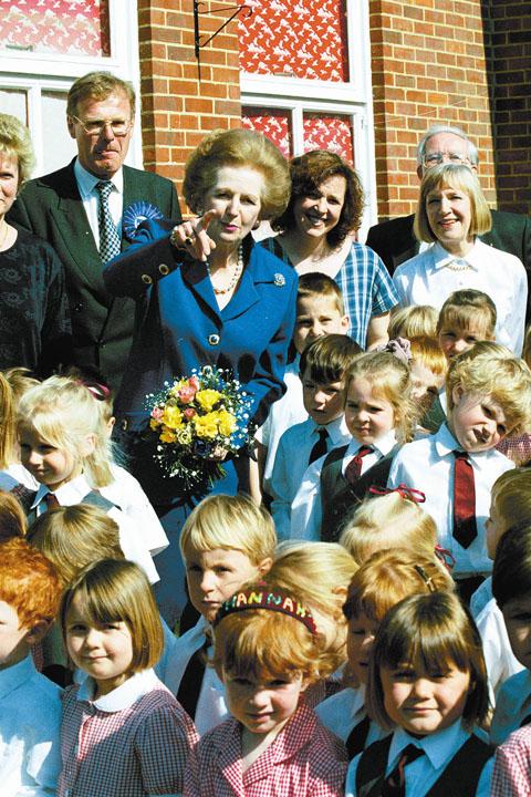Lady Thatcher tells the pupils from the Priory School, Wick Lane, Christchurch to "Smile for the nice photographers".