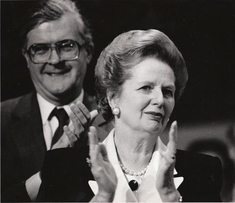 Margaret Thatcher at the Tory Conference in Bournemouth in 1990, applauding John Major's speech