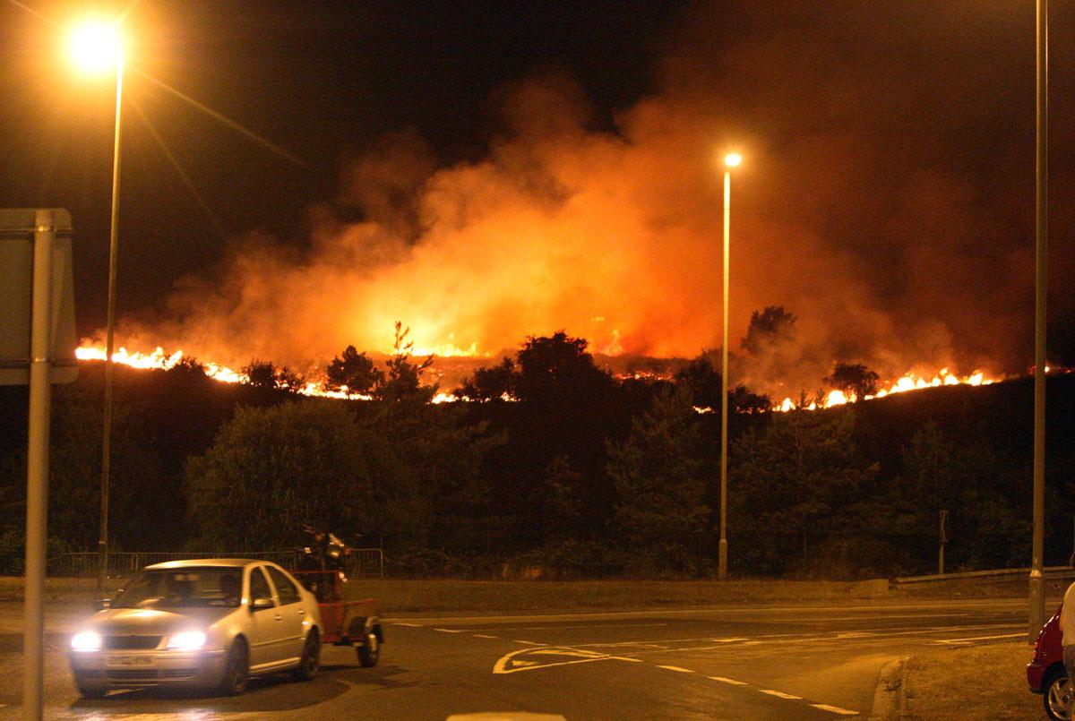 Firefighters battled a huge blazes at Canford Heath after arsonists set fires at several locations