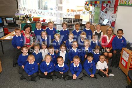 Children in Cherry class at Heatherlands Primary School with Teacher Ros Howe, left, and TA Tracey Watson.