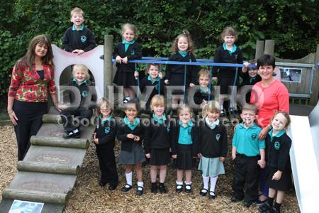 Reception children in Butterflies Class at  Hillbourne School and Nursery in Poole with Teacher Amanda Belbin, right, and TA Jacquie Pickford.