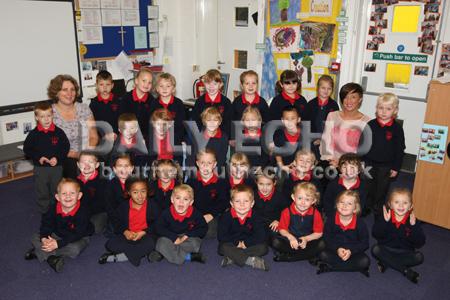 Reception Children at Christ The King RC VA Primary School in Kinson  with Teacher Lucinda Murphy, left, and TA Nicola Evans