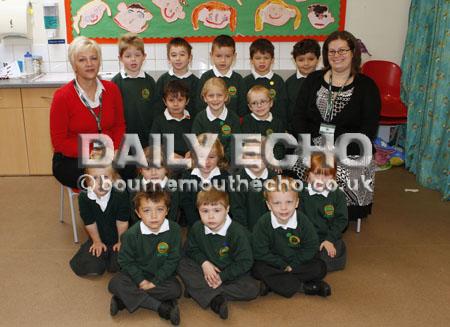 Burton Primary School. Ducks Class with,learning support assistant Mrs Tania Cook, left, and class teacher Mrs Sue Vaughan, right. 