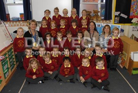 Christchurch Infant School. Class FH with, l-r, class teacher Mrs Yvie Hall and teaching assistants Mrs Mel Barber and Mrs Helen Prichard.
