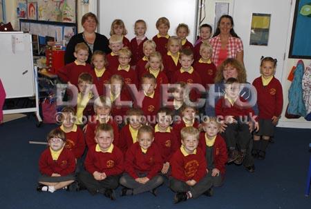 Christchurch Infant School. Class FD with class teacher Miss Nicola Dyer, left, and teaching assistants Mrs Angela Hammond, standing right, and Mrs Sharon Gledhill, seated right.