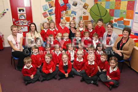 Reception Children at St Mary's  CE VC First School in West Moors with their teacher Sarah Williams, centre, Student Mia Oliver, left, and TA's Abby Collins, Sarah Prosser and Jan Hudson.