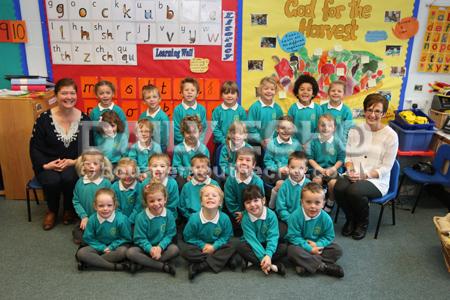 Reception Children at Trinity CE VA First School in Verwood with their Teacher Hilary Viana, left, and TA Vicki Gower.