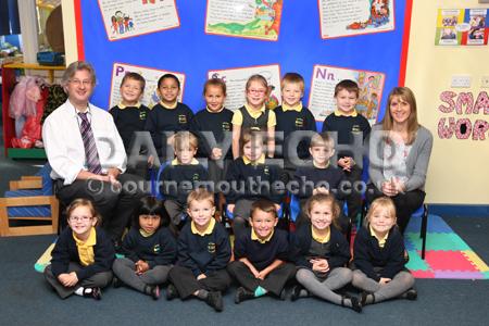Reception children in Ruby Class at  Ferndown First School with their Teacher Sean Watts, left, and TA Kerry March
