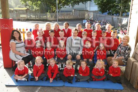 Reception Class children at  Verwood C.E. First School with their Teacher Chris Dear,centre, and TA's Rebecca Boyle,left, and Kathy Reeves.
