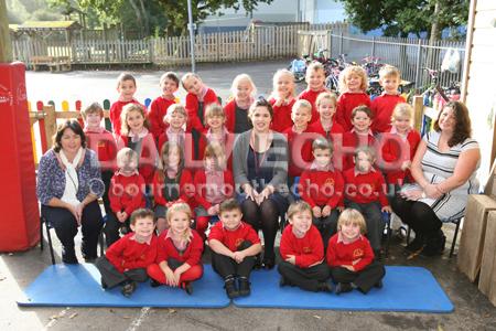 Reception Class children at  Verwood C.E. First School with their Teacher Elle Harding, centre, and TA's Louise Rackley , left, and Rebecca Boyle