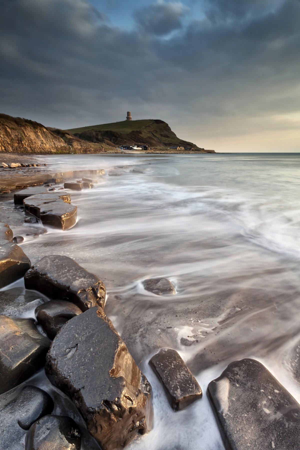 Kimmeridge Bay with Cavell Tower in the distance by Daniel Wretham
