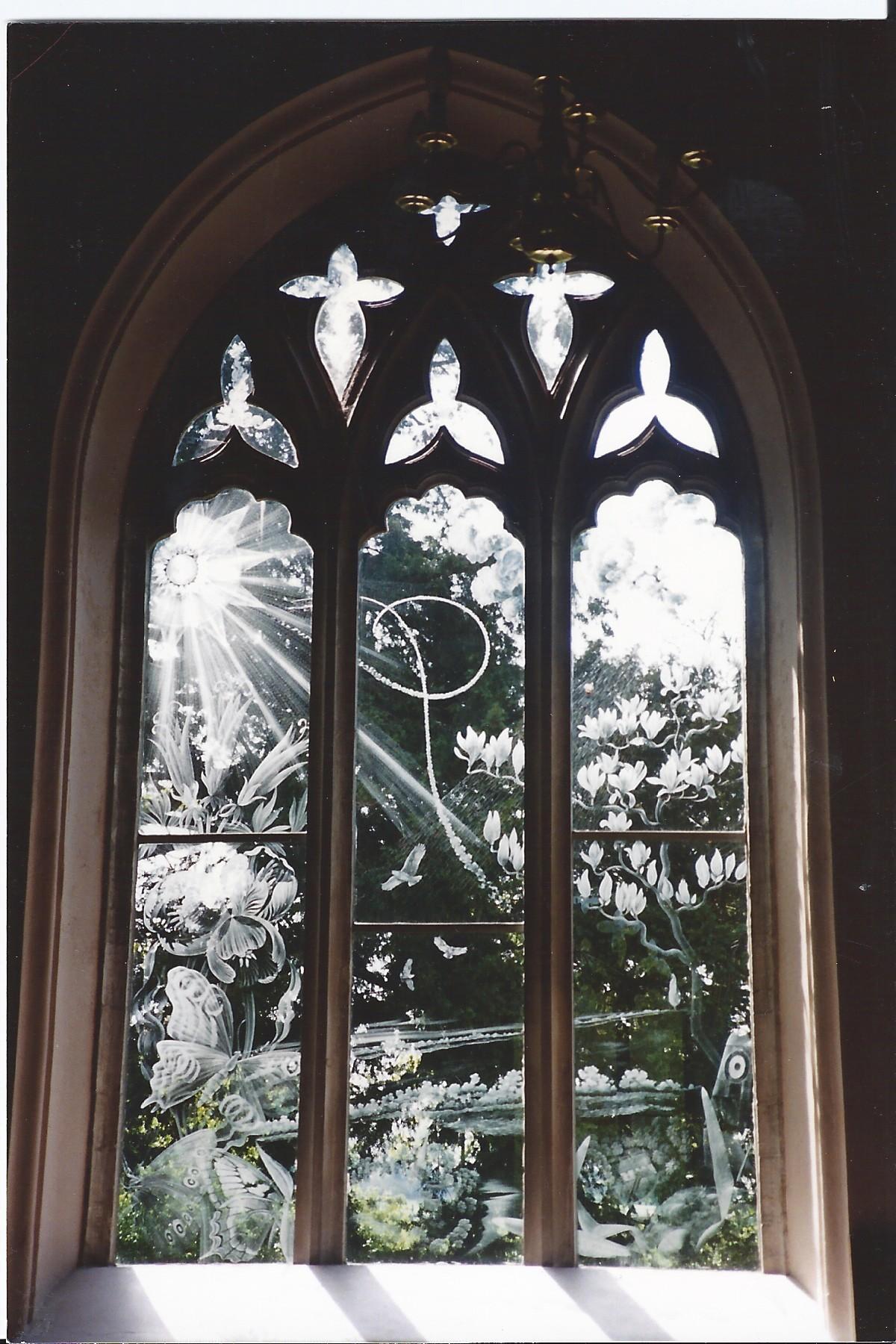 Moreton church and one of the beautiful windows by Annie Chambers