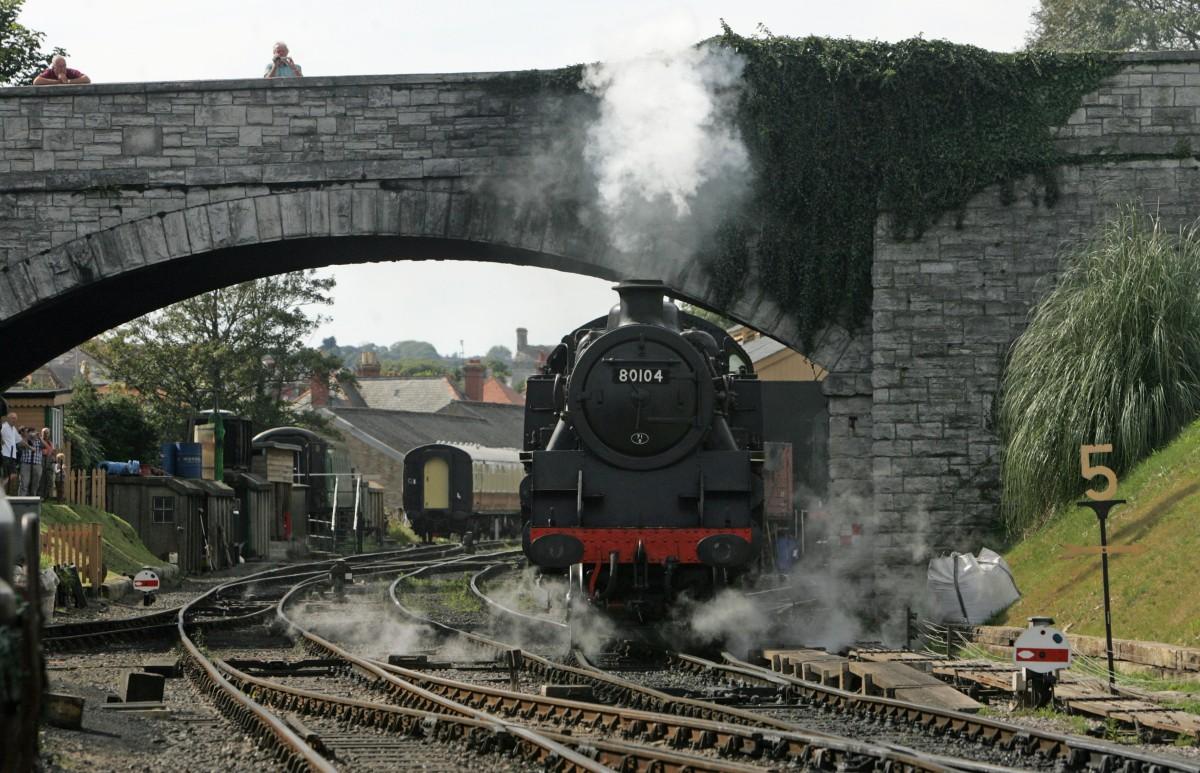 A steam-engine arrives at Swanage Railway's Autumn Grand Steam Gala and Vintage Transport Rally. 