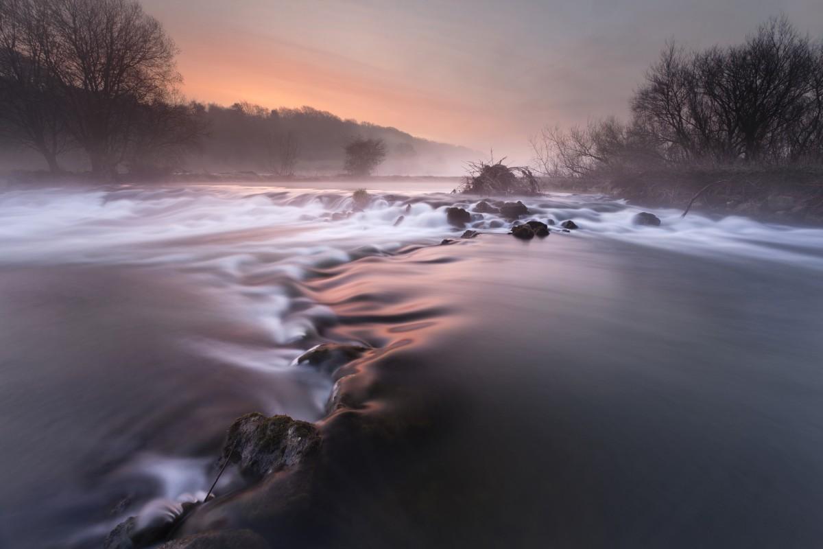 Its the Dorset Stour, Dudsbury Weir which to me is the life line of Dorset, it was a fantastic misty morning just as the sun came up and the icey cold water flowed over the rocks. By Daniel Wretham