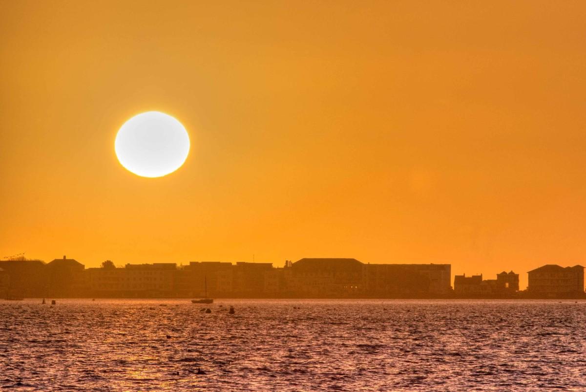 Sandbanks from Poole Quay at sunrise taken by Rick McEvoy Photography