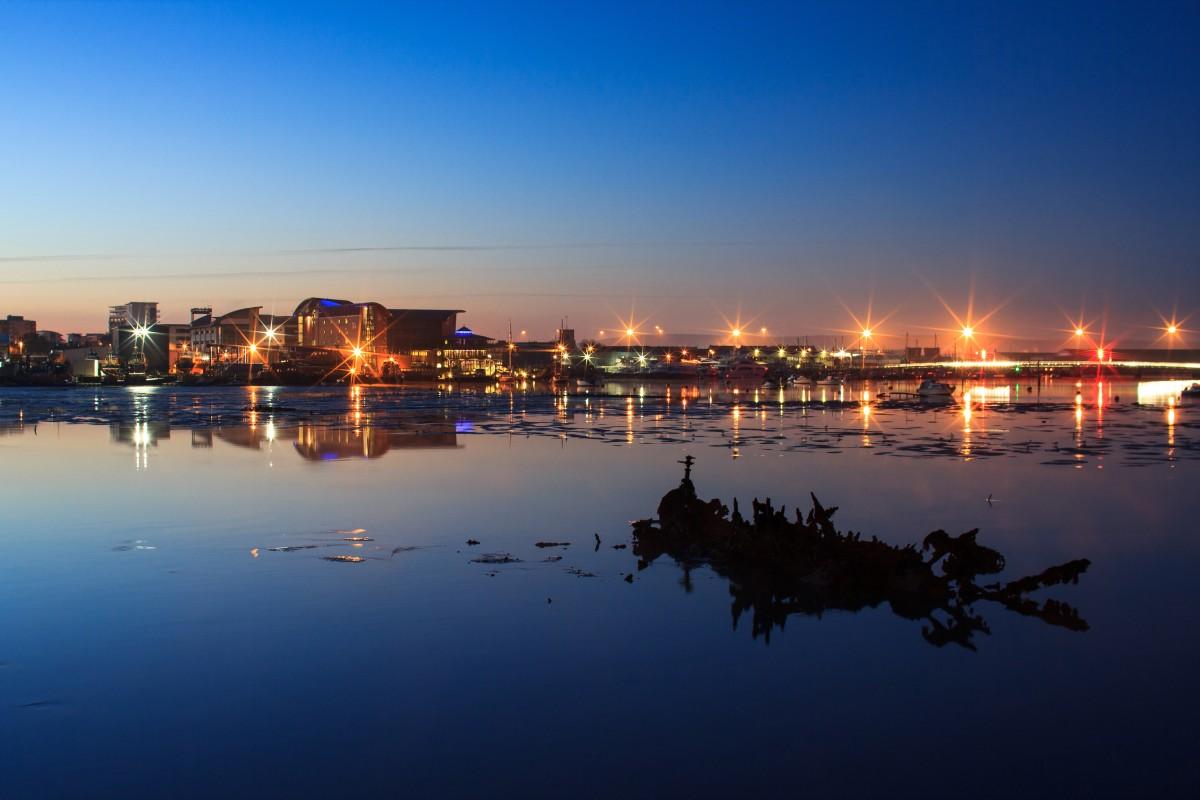 Dawn on a cold December morning r looking over towards the Twin Sails Bridge at Holes Bay. Taken by  Paul Thrift