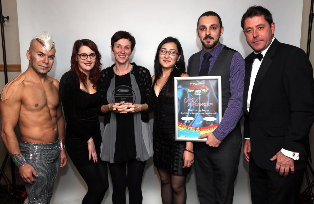 The Living Room, Winners of the Small Hote; or Guest Accommodation of the Year Award at the Bournemouth Tourism Awards 2013. Chelsie Roslun, Teresa Busby, Munisa Akhmedova, Zack Busby, and Sponsor Matthew Barker, of the Barker Group. 