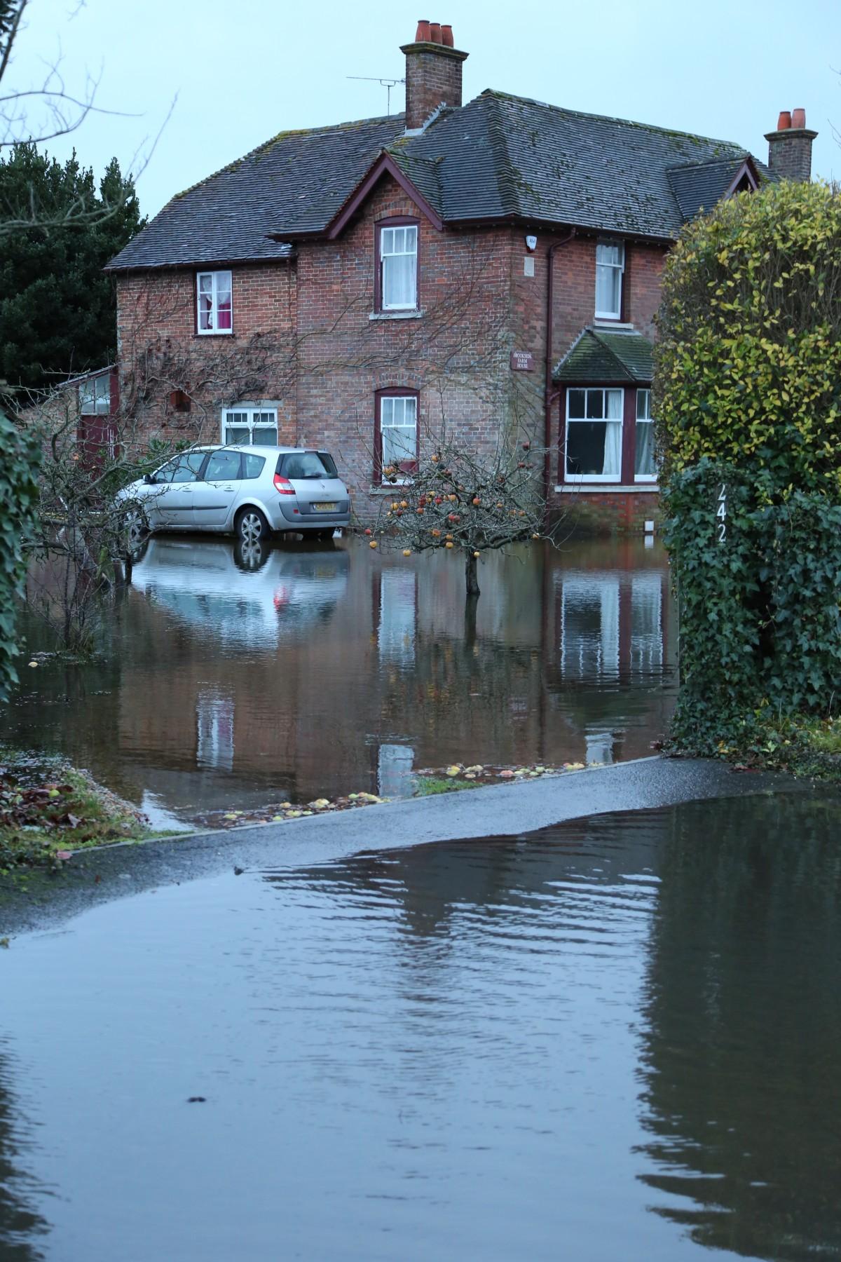 Pictures taken by Daily Echo photographers and readers after heavy rain and strong winds hit Dorset on December 23 and 24, 2013. Flooded driveway in Leigh Road in Wimborne,