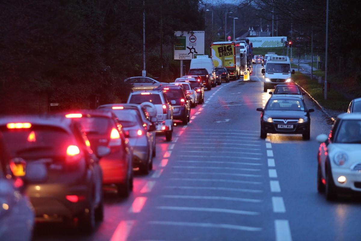 Pictures taken by Daily Echo photographers and readers after heavy rain and strong winds hit Dorset on December 23 and 24, 2013. Traffic queues through Stapehill heading towards Wimborne due to the closed A31 section. 