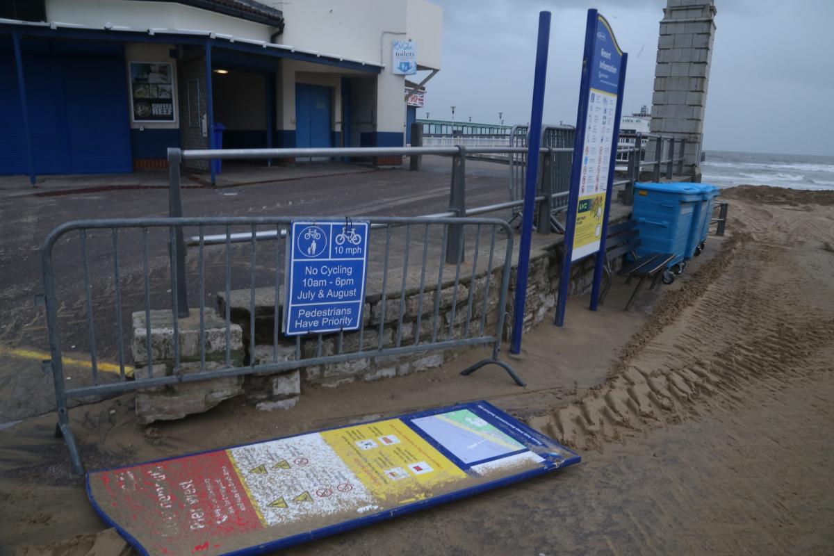 Pictures taken by Daily Echo photographers and readers after heavy rain and strong winds hit Dorset on December 23 and 24, 2013. Lifeguard sign torn off in the wind at Bournemouth beach,