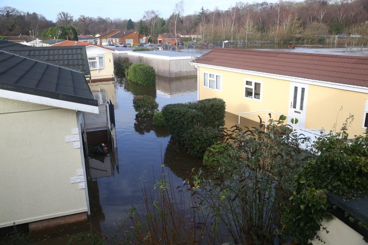 Pictures taken by Daily Echo photographers and readers after heavy rain and strong winds hit Dorset on December 23 and 24, 2013. Flooding at Gladelands Caravan Park in Ferndown.  
