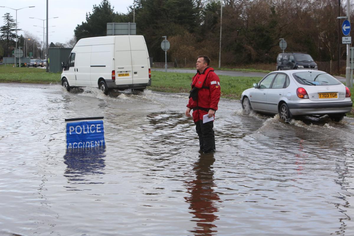 Pictures taken by Daily Echo photographers and readers after heavy rain and strong winds hit Dorset on December 23 and 24, 2013. Flooding on the A348 Ringwood Road near Ferndown