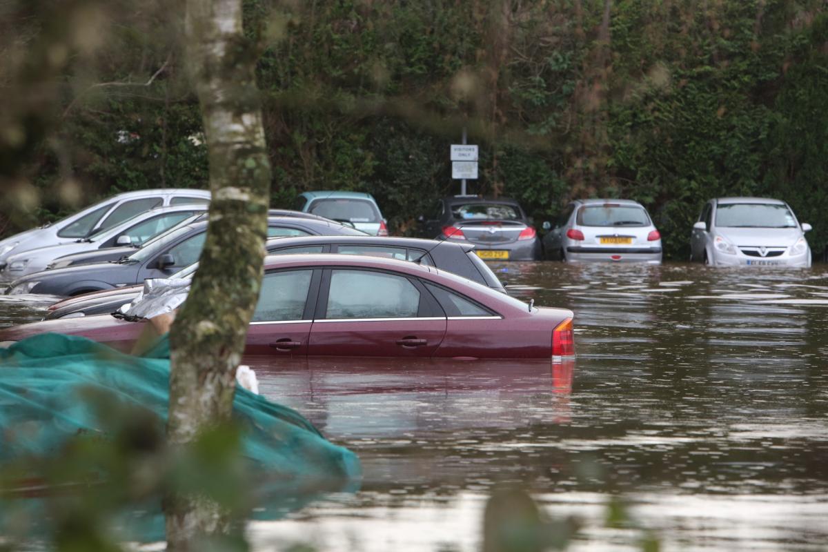 Pictures taken by Daily Echo photographers and readers after heavy rain and strong winds hit Dorset on December 23 and 24, 2013.  Residents are evacuated from the Gladelands Caravan Park near Ferndown. 
