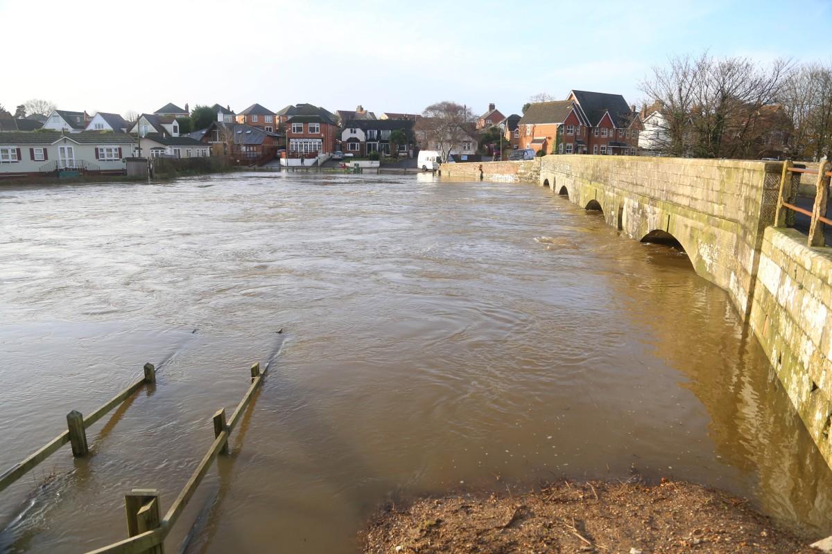 Heavy rain and strong winds cause flooding and high tides across Dorset. Flooding at Iford Bridge,