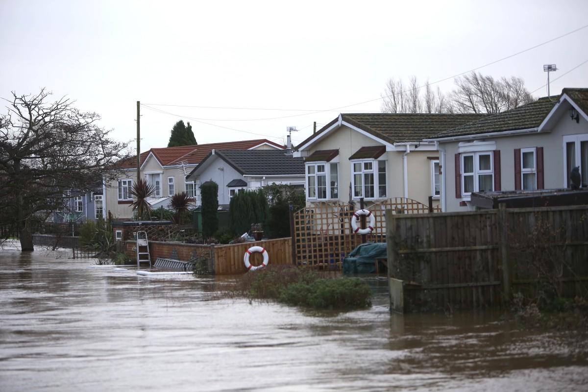 Heavy rain and strong winds cause flooding and high tides across Dorset. Flooding at Iford Bridge Home Park. 