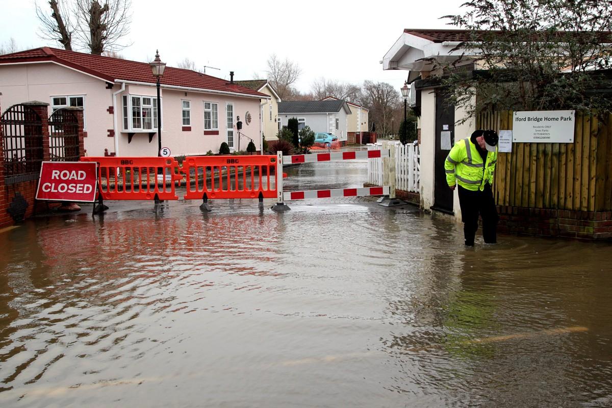 Heavy rain and strong winds cause flooding and high tides across Dorset. Flooding at Iford Bridge Home Park. 