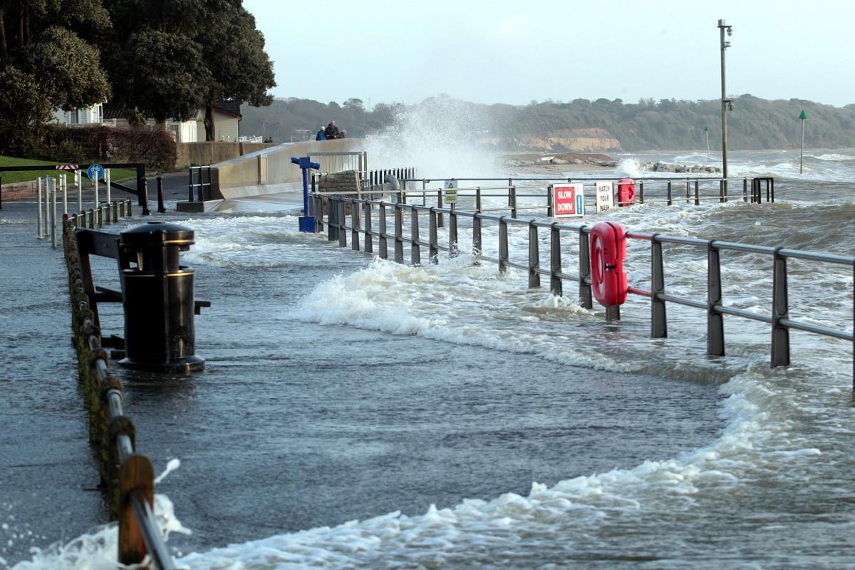 Heavy rain and strong winds cause flooding and high tides across Dorset. Flooding at Mudeford Quay.