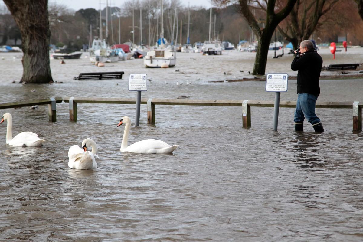 Heavy rain and strong winds cause flooding and high tides across Dorset. High Tide at Christchurch Quay.
