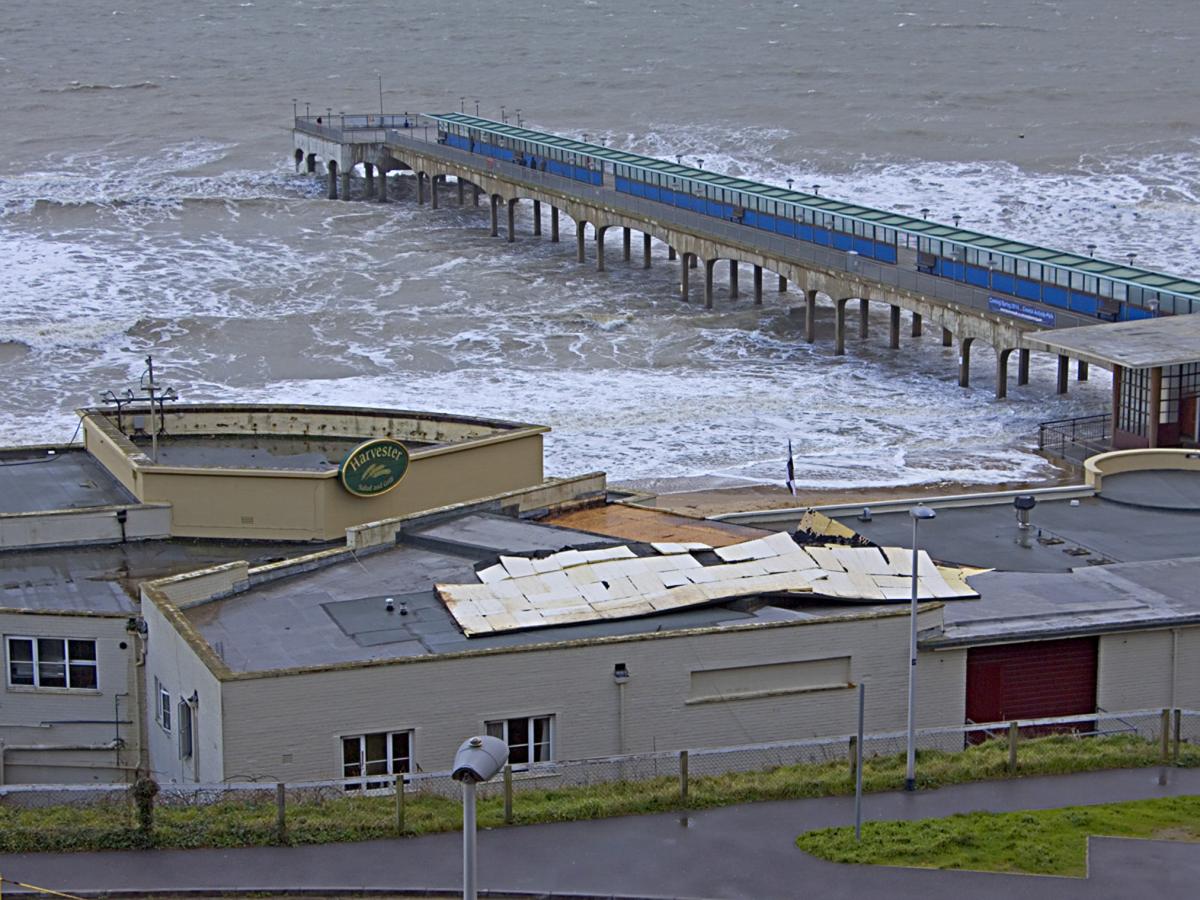 Heavy rain and strong winds cause flooding and high tides across Dorset. Roof blown off Neptune Harvester at Boscombe Pier. Picture by Mark Osborne.
