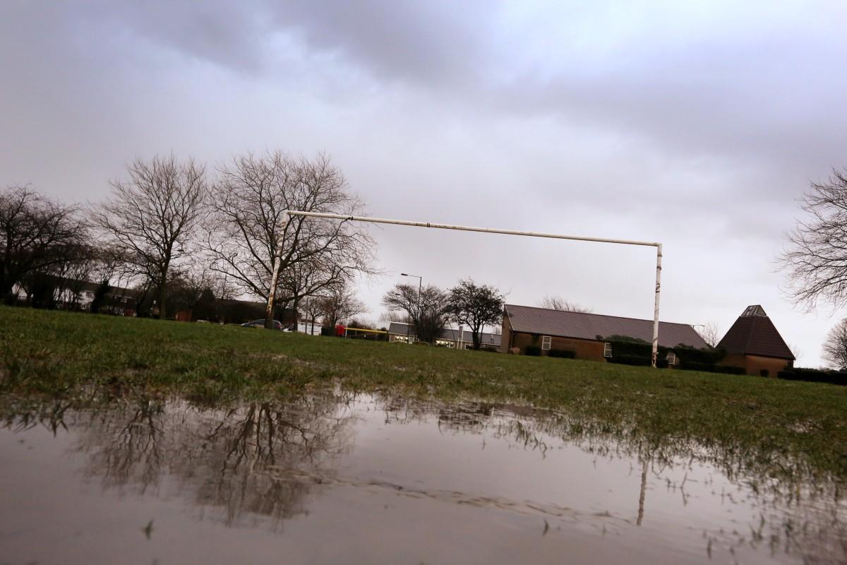 Heavy rain and strong winds cause flooding and high tides across Dorset.  Waterlogged pitches at Slades farm.