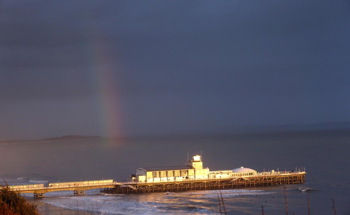 Rainbow over Bournemouth Pier at the end of another wet and stormy day
