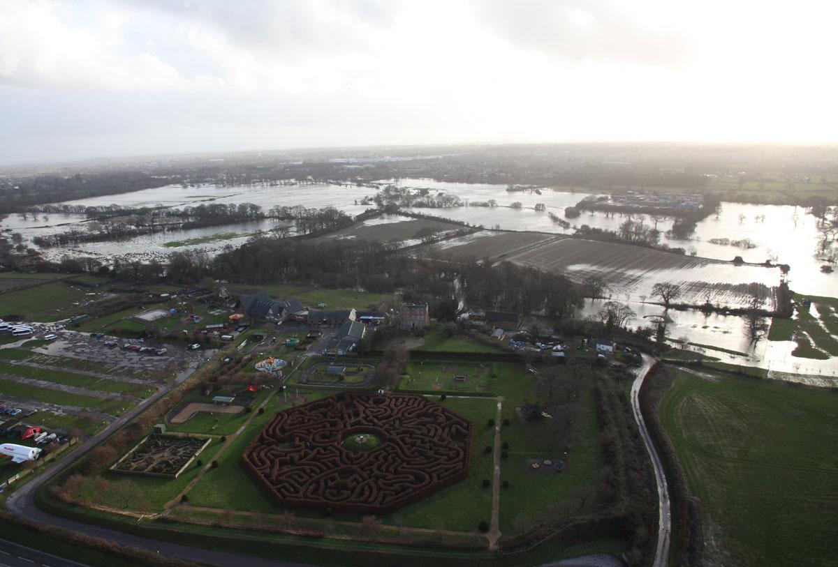 Daily Echo photographers and readers braved the stormy weather to capture these moments across Dorset.  Aerial pictue of Alice in Wonderland attraction and floods in the surrounding  fields. Picture by Gary Ellson, Bournemouth Helicopters.