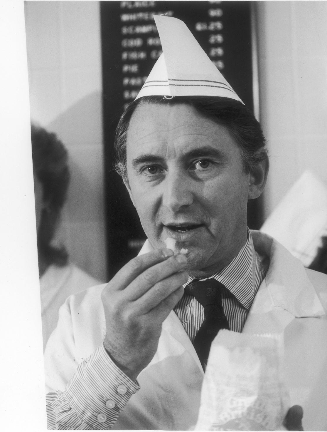 David Steel, liberal leader dons white cap  and overalls  when he visited Tony Watt's fish bar Old Christchurch Road, Bmth, to discuss VAT charges, 1984