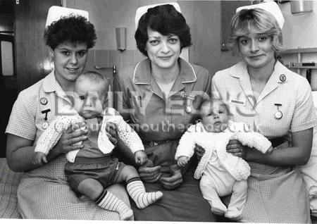 1988,  Nurses Yvette Trew (with baby Michala) and Nicola Griffin (with son Sean) are the first to job share at Poole Hospital seen here with ward sister Tracey Deadman - centre.