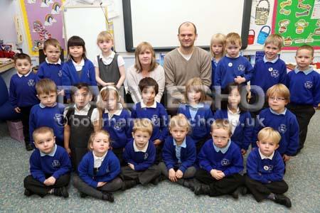 TA Chris Toop and Teacher Tim Jeffries with Sycamore class at Ashley Infants School.