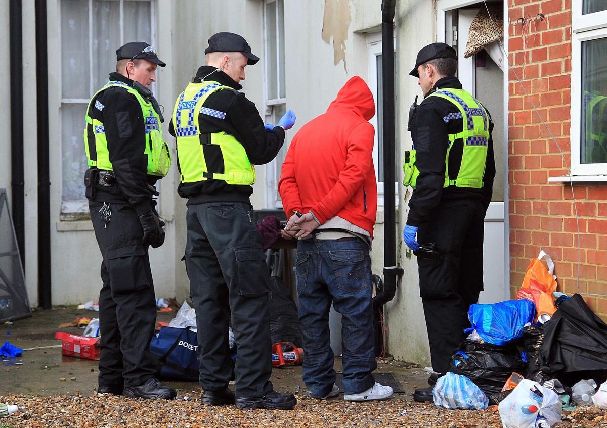 Police raid a flat in Walpole Road on February 10, 2014 as part of a crackdown on burglaries. 138 people have been arrested under Operation Castle.