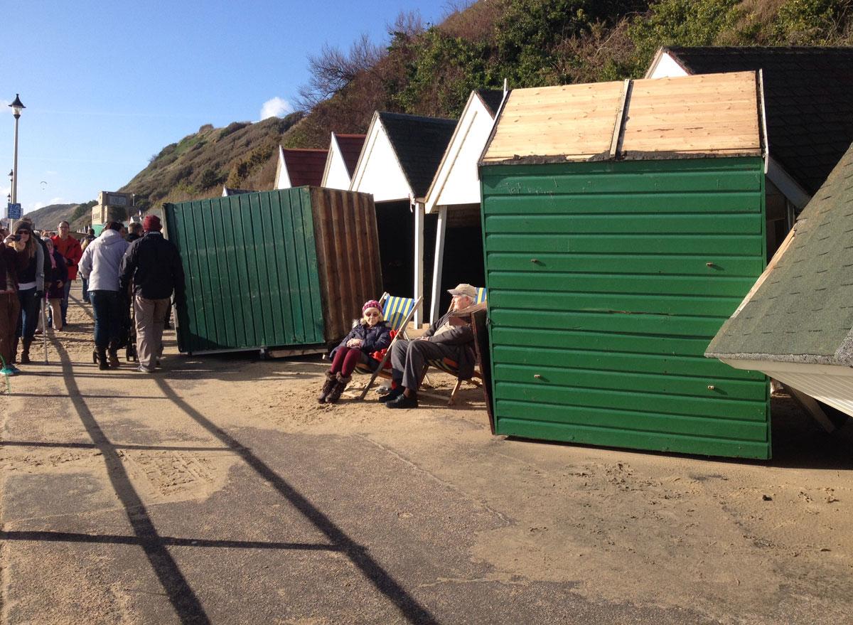 Daily Echo reader photos of the storm and damage left behind after severe weather swept through Dorset on February 14 and February 15. Picture of beach hut owners at Fisherman's Walk sent by Penny Orchard 